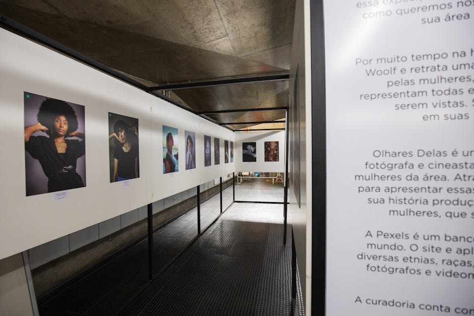 Stylish photography exhibition focusing on women's portraits in an art gallery setting.